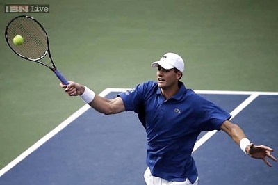 Towering Isner emerges as America's hope for Flushing Meadows