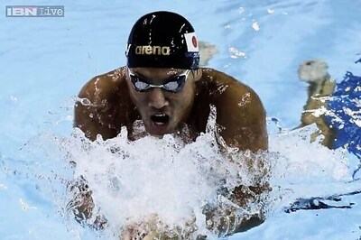 Japanese swimmer charged with stealing camera at Asiad
