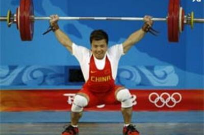 Zhang wins men's 62kg weightlifting gold