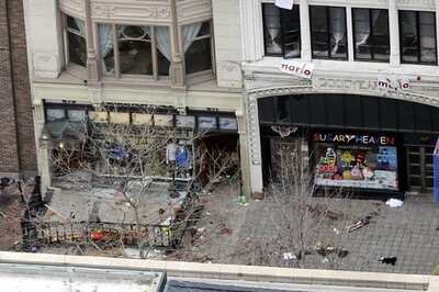 Boston blasts: Eight-year-old boy among dead