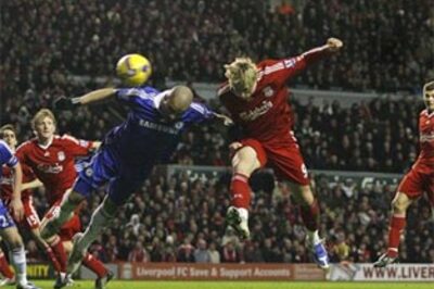 Torres powers Liverpool's win over 10-man Chelsea