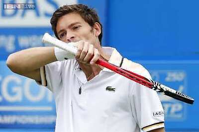 Defending champ Mahut ousted by Groth at Newport