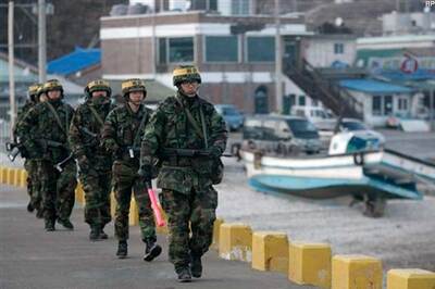 South Korea stages live fire drill near border