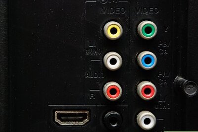 How to Hook Up a DVD Player Through a VHS Recorder and TV