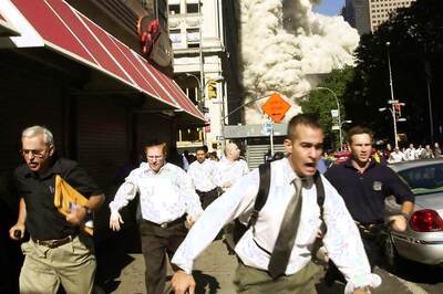 Man Clicked Fleeing Smoke, Debris in Iconic 9/11 Photo Dies from Covid-19 in Florida