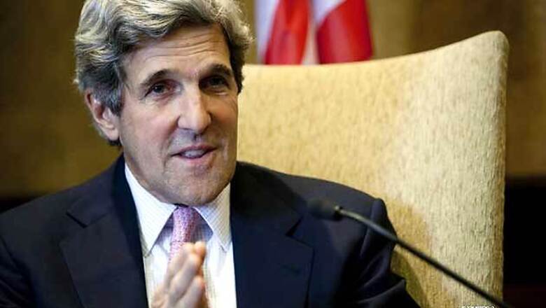 Kerry in Afghanistan to prod Karzai on future ties