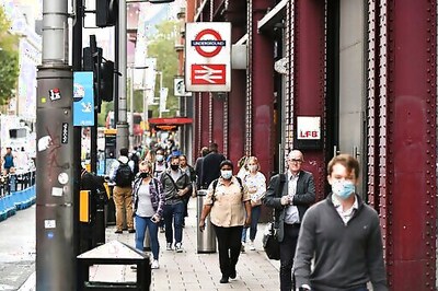 UK Government Defends New Virus Strategy; Experts Skeptical