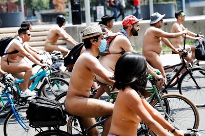 No Shirts, Pants or Undies Needed on Bike Ride, Just a Mask