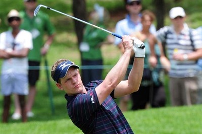 Donald takes on Lytham with new caddie