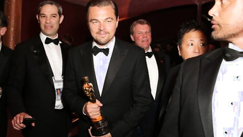 Leonardo DiCaprio gets his name etched on Oscar trophy and his childlike eagerness is worth watching