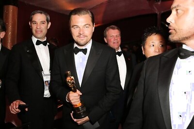 Leonardo DiCaprio gets his name etched on Oscar trophy and his childlike eagerness is worth watching