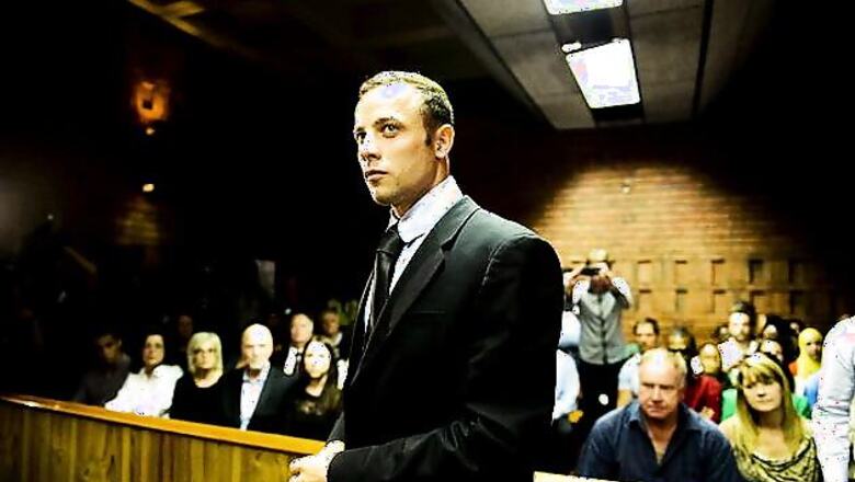Pistorius forced out of hiding for trial hearing