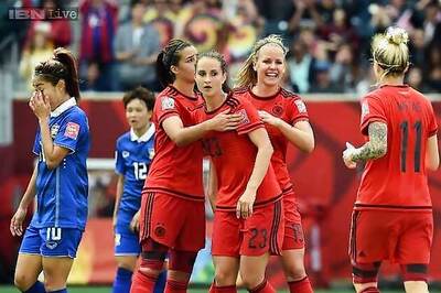Germany take top spot in Group B with Thailand rout