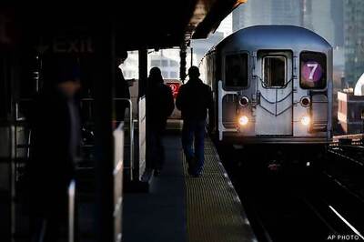 Indian's subway death: NY woman's arraignment postponed