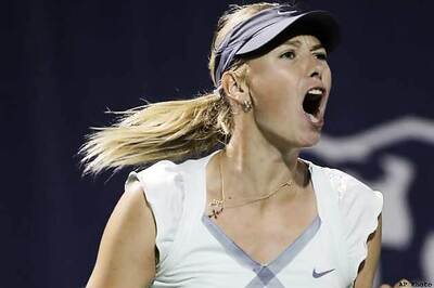 Sharapova, Wozniacki advance in Stuttgart