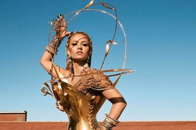 MET GALA 2022: Natasha Poonwalla Aces Gilded Glamour in Sabyasachi Sari & Schiaparelli corset