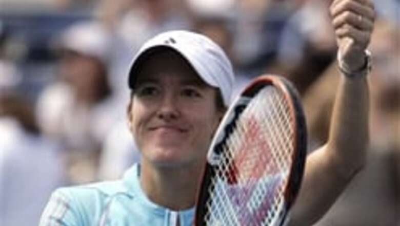 Henin downs Williams to enter last 4