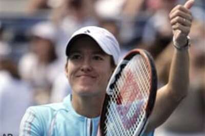 Henin downs Williams to enter last 4
