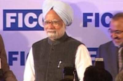 'Invest more at home' PM tells India Inc