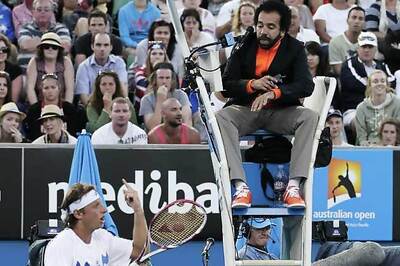 Angry Nalbandian slams referee after Isner loss