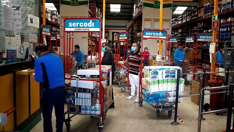 Spain Death Toll Continues to Fall, Construction and Manufacturing Sectors Return to Work
