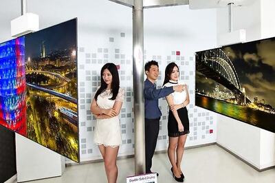 LG shows off double-sided OLED TV that lets you watch shows on either sides simultaneously
