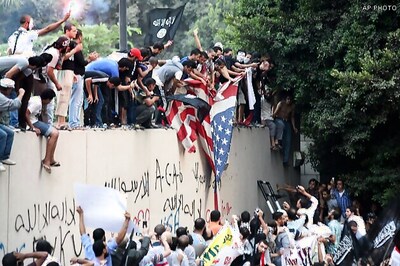 US buildings attacked in Egypt, Libya; one dead