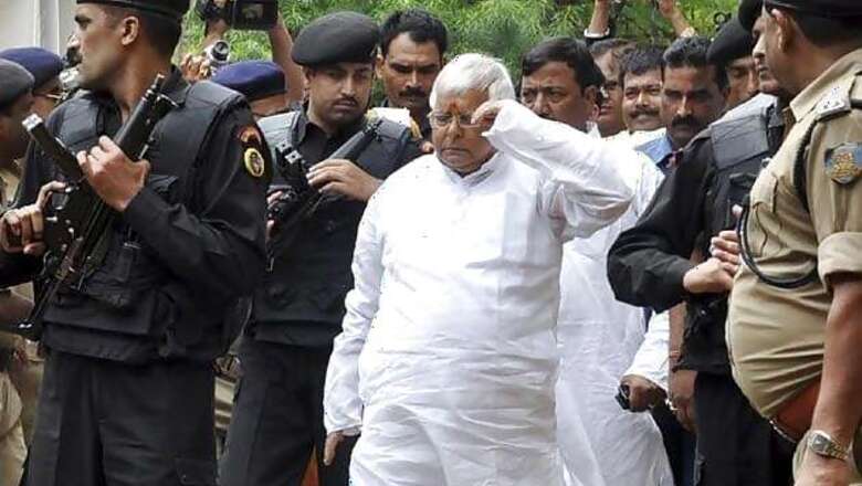 Lalu Prasad appears before special CBI courts in fodder cases