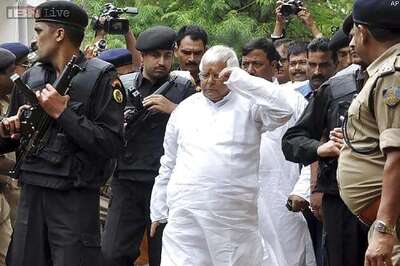 Lalu Prasad appears before special CBI courts in fodder cases