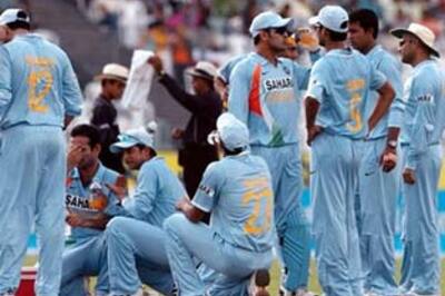 Dhoni leads team off field after crowd trouble