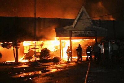 About 200 prisoners break out of overcrowded jail in Indonesia