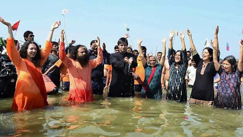 Snapshot: Vivek Oberoi takes a holy dip at Sangam