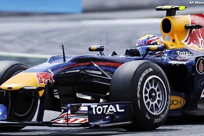 Vettel takes pole with Webber alongside