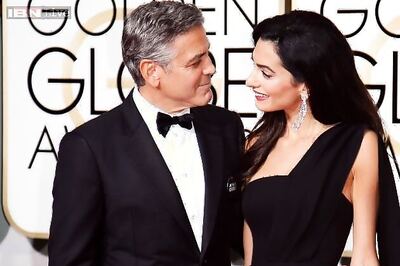 Photo of the day: George Clooney looks seriously smitten as he poses with wife Amal Amaluddin at Golden Globes 2015