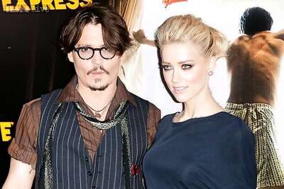 Is Amber Heard under pressure to marry Johnny Depp?