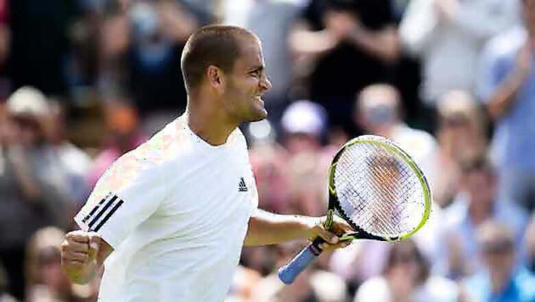 Russia's Mikhail Youzhny sets up Murray clash