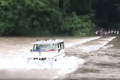 Watch Brave Cops Drive SUV Across River to Rescue Stranded Family in Kerala [Video]