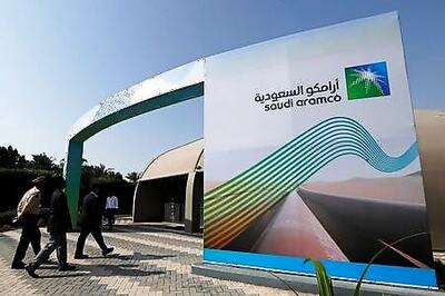 Saudi Aramco's profit plunges, sees signs of oil market recovery