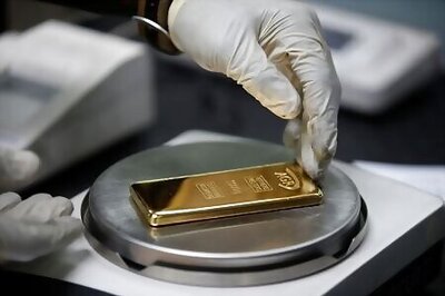 Gold dips below $2,000 as dollar steadies; Fed minutes in focus