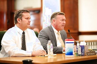 Prosecutor: Couple talked by phone on day kids' bodies found