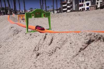 Watch: This Toy Car Track on the Beach Will Set Your Pulse Racing