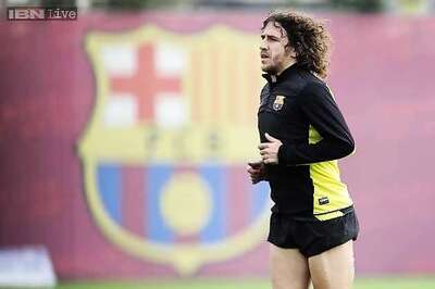 Barca hire Puyol as assistant to sporting director
