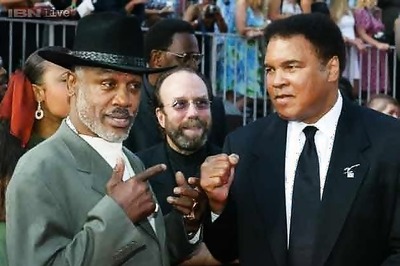 Muhammad Ali's 'Fight of the Century' gloves sell for nearly 400,000 dollars