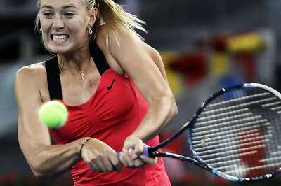 Azarenka, Sharapova in third round at Madrid