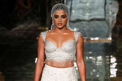 Wamiqa Gabbi Captivates in Abu Sandeep's Ivory Trail Lehenga and Webbed Headgear On Day 1 of ICW 2024