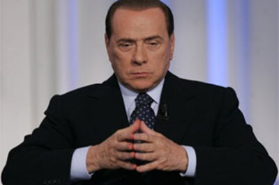 Italian PM Berlusconi struck in face, bloodied
