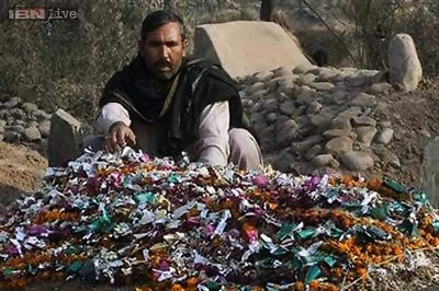 Burying the dead after Pakistan's school massacre