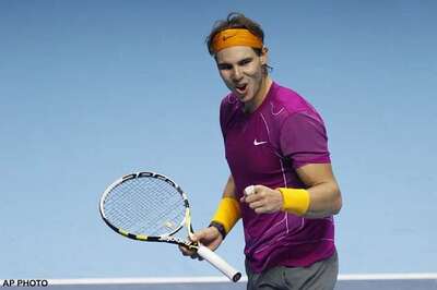 Nadal beats Djokovic, tops Group A