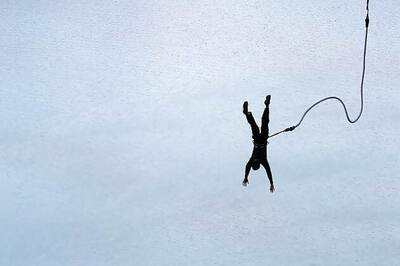 Snapped bungee plunges tourist into African river