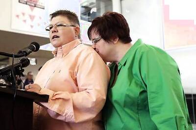 Judge strikes down Michigan's ban on gay marriage